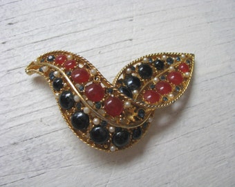 Vintage Coro gold tone bird brooch pin with red white blue stone