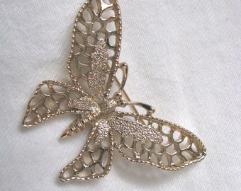 Splendid Madame Butterfly open design gold tone brooch pin by Sarah Coventry