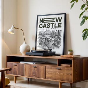 A minimalist New Castle Upon Tyne city wall art print focusing on clean lines and subtle contrasts to represent the skyline in an artistic way. This New Castle Upon Tyne cityscape poster is perfect for those who appreciate understated design, bringing a calm yet impactful interpretation into your home.