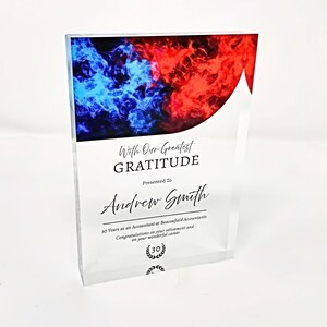 Celebrate professional milestones with our personalised acrylic award plaques. Perfect for employee recognition, work anniversaries, retirements, and corporate gifts. Customise with names, years of service, award reasons, and company logos.