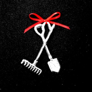 May include: A pair of gardening tools, a rake and a shovel, are tied together with a red ribbon bow.