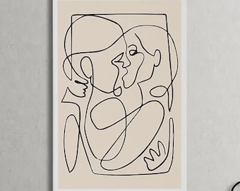 May include: A rectangular wall art print featuring a continuous black line drawing of two figures embracing on a solid beige background. The artwork is enclosed within a thin white frame, showcasing an abstract depiction of two faces.