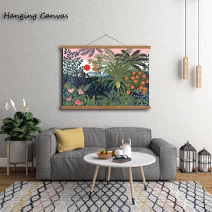 May include: A hanging canvas print featuring a vibrant jungle scene with lush green foliage, orange fruits, and a red sun against a pink sky. The text "Hanging Canvas" is at the top left.