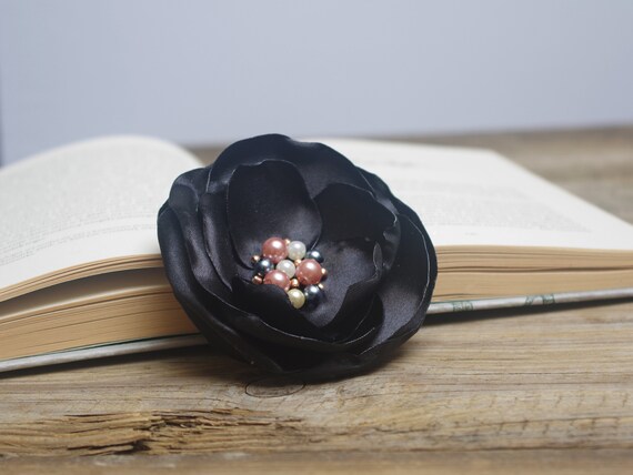 Black flower pin accessories discount