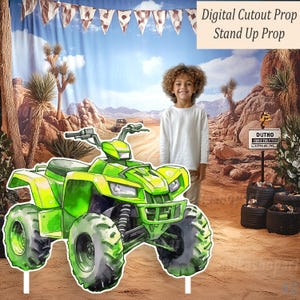 May include: A digital cutout prop of a lime green ATV with black tires, set against a desert backdrop. The prop is labeled "Digital Cutout Prop Stand Up Prop". A young person stands next to the ATV.