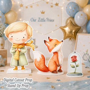 May include: Cutout props for a baby shower or birthday party. The props include a cartoon illustration of a young boy, a fox, and a rose in a glass dome. The text "Our Little Prince" is visible in the background, along with balloons and stars. The text "Digital Cutout Prop Stand Up Prop" is also visible.