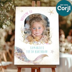 May include: A mermaid-themed birthday welcome sign featuring a young girl's photo. The sign includes the text "Welcome To" in pink, "Samantha's Fifth Birthday" in teal, and a mermaid tail illustration. Decorative elements include seashells and starfish.
