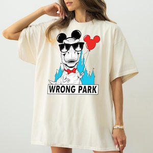 Wrong Park T-Shirt, Funny T-Rex with Mickey Ears Shirt, Jurassic Park Disney Parody Tee, Family Vacation Shirt, Humorous Theme Park Apparel