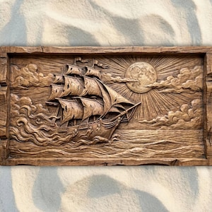May include: A rectangular wooden wall plaque featuring a detailed relief carving of a sailing ship on the ocean. The scene depicts a vessel with tattered sails moving through waves under a large, textured moon surrounded by radiating sunbeams.