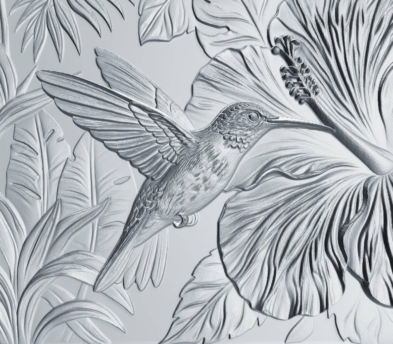 May include: A monochromatic silver-toned relief panel featuring a detailed hummingbird in flight, positioned near a large hibiscus flower. The design includes textured tropical foliage and leaves surrounding the central bird and flower motif.