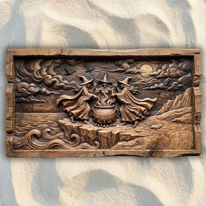 May include: A rectangular wooden wall plaque featuring a detailed relief carving of three figures in pointed hats standing around a central cauldron on a cliffside. The scene includes rolling ocean waves, a cloudy sky, birds, and a full moon.