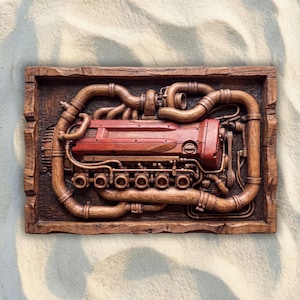 May include: A rectangular wooden wall carving depicting a detailed engine block with a prominent red valve cover. The sculpture features intricate relief work showing various pipes, tubes, and mechanical components surrounding the central engine.