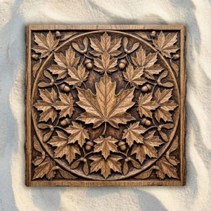 May include: A square wooden wall plaque featuring an intricate relief carving of a large central maple leaf surrounded by smaller maple leaves, acorns, and winged seeds arranged in a circular pattern with a dark brown stained finish.