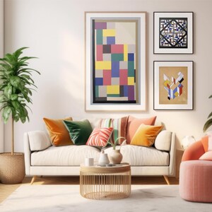 May include: A living room interior with a white sofa, two armchairs, a coffee table, and two potted plants. The walls are decorated with three abstract paintings in black, white, and colorful geometric patterns.