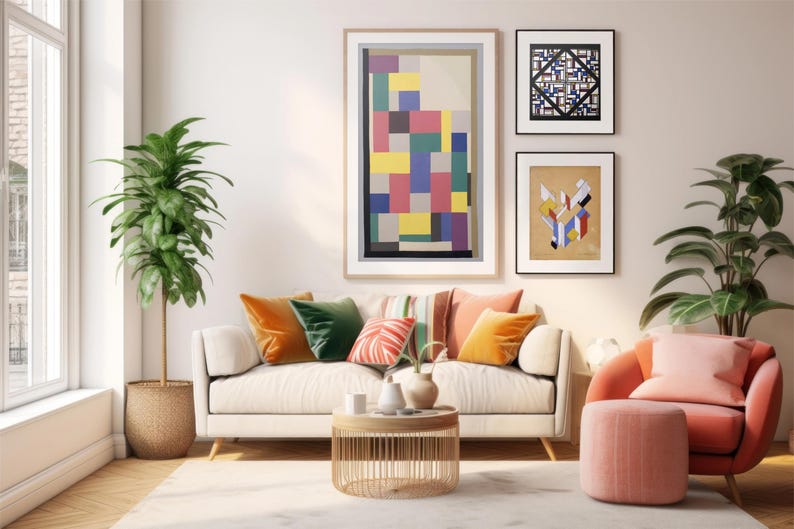 May include: A living room interior with a white sofa, two armchairs, a coffee table, and two potted plants. The walls are decorated with three abstract paintings in black, white, and colorful geometric patterns.
