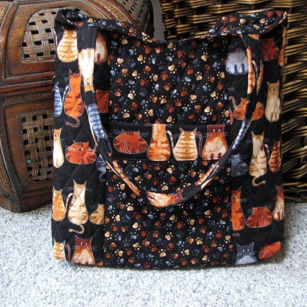 Pet Lover Quilted Black and Orange Tote adorned with cats