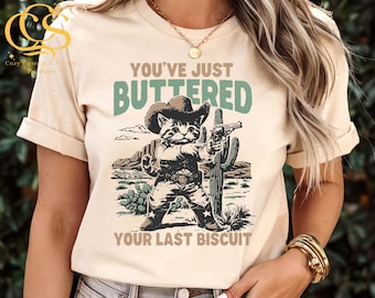 You've Just Buttered Your Last Biscuit Shirt, Western Cat Shirt, Funny Cowboy Cat T-shirt, Yee'd Your Last Haw Shirt, Cat Tee,Trendy T shirt