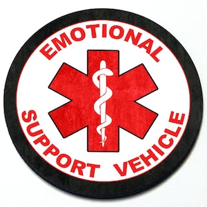 Könnte beinhalten: Ein runder Aufkleber in Schwarz und Weiß mit einem roten Stern-des-Lebens-Symbol und dem Text "Emotional Support Vehicle".