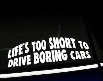 Life Is Too Short To Drive Boring Cars. A Happy Young Man Driving In His Convertible Image491534737