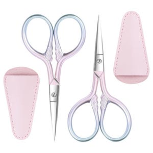 May include: Two pairs of embroidery scissors with silver blades and handles featuring a gradient of pastel pink and light blue. The handles have a textured, leaf-like design at the base of the finger loops. Two light pink protective sheaths are included.