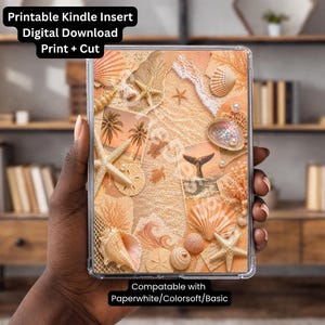 May include: A rectangular Kindle insert featuring a collage of beach-themed imagery including seashells, starfish, palm trees, a whale tail, and sand textures. The text reads: Printable Kindle Insert Digital Download Print + Cut and Compatable with Paperwhite/Colorsoft/Basic.
