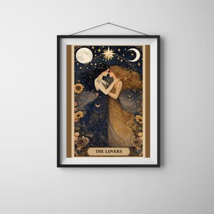 The Lovers Sapphic Art Print, Lesbian Wedding Gift, Whimsigoth Decor, Queer Art Poster. A beautifully illustrated sapphic art print that blends whimsigoth decor, celestial romance, and vintage aesthetics. Featuring two lovers entwined beneath a dreamy night sky, this piece radiates warmth, connection, and cosmic harmony. Displayed in simple black frame on neutral wall.