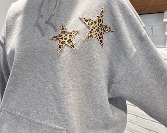 Sweat à capuche patchwork guépard étoiles