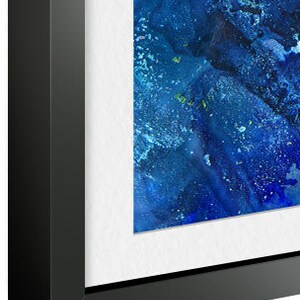 May include: A framed abstract painting with a blue and green color scheme. The painting is framed in a black frame.