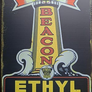 May include: A vintage metal sign with a lighthouse design, the word "BEACON" in bold letters. The sign also features the text "ETHYL GASOLINE" and "A CAMINOL PRODUCT" in a retro style, with a black background and yellow and red accents.