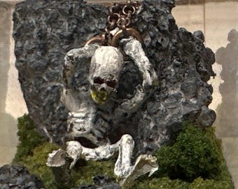 Gek skeletdiorama. De dingen die we hebben opgeborgen.