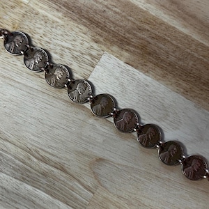 Penny Bracelet Men’s. Very unique, handcrafted piece, sure to attract plenty of looks. Copper can also have health benefits when wearing.