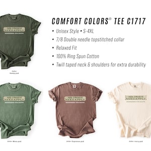 Graphic tee featuring the phrase “No Irish Need Apply” with “Remember Our Roots” printed beneath in bold white lettering. A vintage, historical design on a Comfort Colors® cotton shirt, perfect for Irish Americans, history buffs, educators, and those honoring immigrant heritage. Ideal for St. Patrick’s Day, cultural pride, or anti-discrimination messaging. Available in unisex sizing.