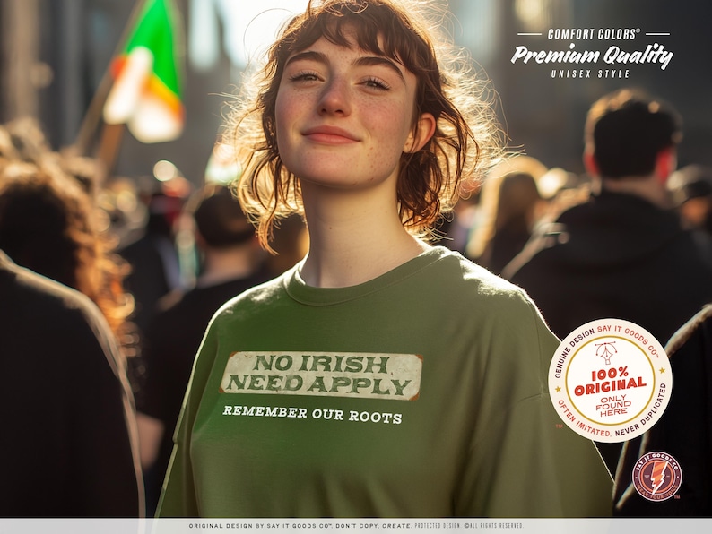 Graphic tee featuring the phrase “No Irish Need Apply” with “Remember Our Roots” printed beneath in bold white lettering. A vintage, historical design on a Comfort Colors® cotton shirt, perfect for Irish Americans, history buffs, educators, and those honoring immigrant heritage. Ideal for St. Patrick’s Day, cultural pride, or anti-discrimination messaging. Available in unisex sizing.