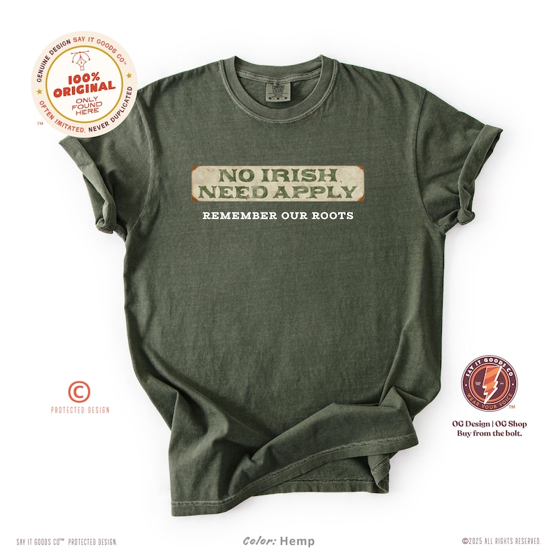 Graphic tee featuring the phrase “No Irish Need Apply” with “Remember Our Roots” printed beneath in bold white lettering. A vintage, historical design on a Comfort Colors® cotton shirt, perfect for Irish Americans, history buffs, educators, and those honoring immigrant heritage. Ideal for St. Patrick’s Day, cultural pride, or anti-discrimination messaging. Available in unisex sizing.