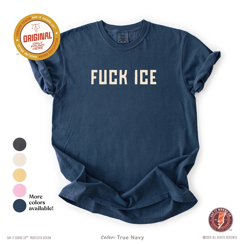 May include: True navy blue t-shirt with the text "FUCK ICE" in a bold, white, block font. The shirt has a crew neck and short sleeves. Additional colors are available. The shirt has a vintage look.