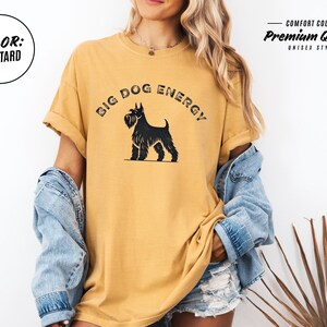 Big Dog Energy Comfort Colors® Shirt featuring a vintage-style schnauzer silhouette with bold, distressed typography. Available in multiple colors, this funny schnauzer t-shirt is perfect for dog lovers, schnauzer owners, and small dogs with big attitudes.