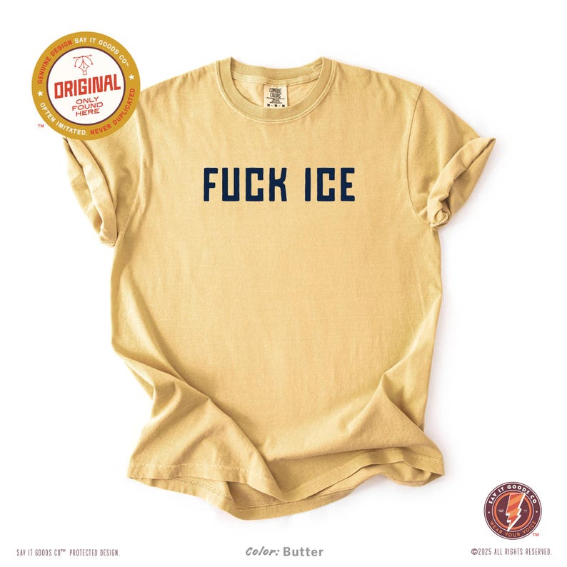 May include: Butter-colored t-shirt with the text "FUCK ICE" in navy blue block letters. The shirt has a crew neck and short sleeves. The image also includes the text "ORIGINAL" and "Color: Butter".