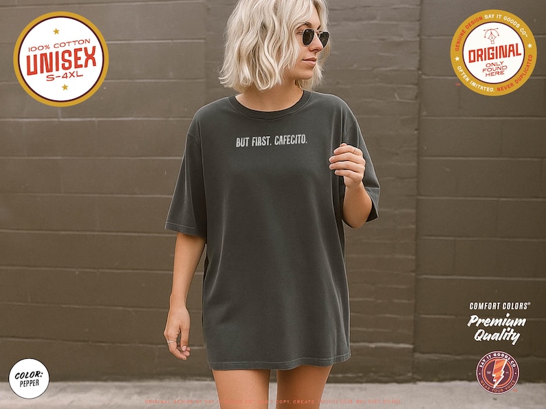 Minimalist “But First. Cafecito.” graphic tee in espresso brown featuring cream typography. Latina coffee lover shirt celebrating Hispanic culture and morning cafecito ritual. Modern unisex coffee shirt perfect for espresso lovers, brunch outfits, and gift ideas for moms, sisters, and café fans.