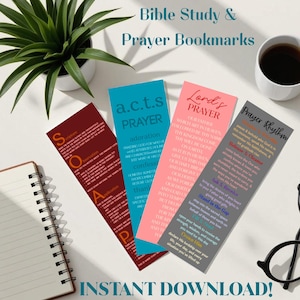 May include: Four colorful Bible study and prayer bookmarks with text. The bookmarks are in shades of red, blue, pink, and gray. The text includes "a.c.t.s PRAYER", "Lord's PRAYER", and "Prayer Rhythm". The image also includes a plant, a cup of coffee, and a notebook.