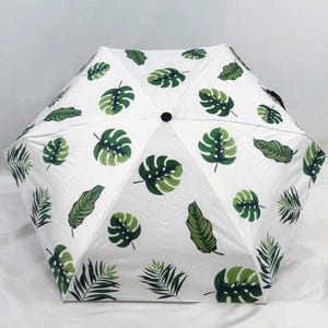 Tropical Print Compact Umbrella: Pocket-Size Sun & Rain Protection