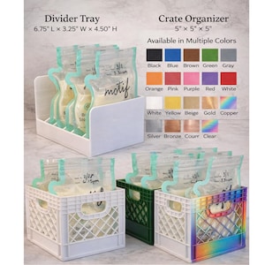 May include: A white divider tray, 6.75" L x 3.25" W x 4.50" H, and crate organizers, 5" x 5" x 5", are shown. The crate organizers are available in multiple colors. The tray and crates hold clear bags with the word "motif" on them.