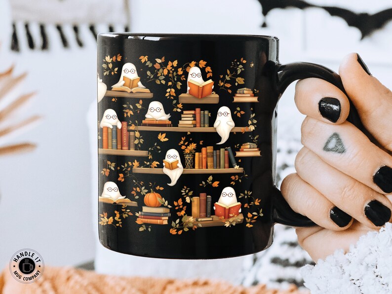 Bookworm girl holding her Halloween mug gift with ghosts reading books pattern.
