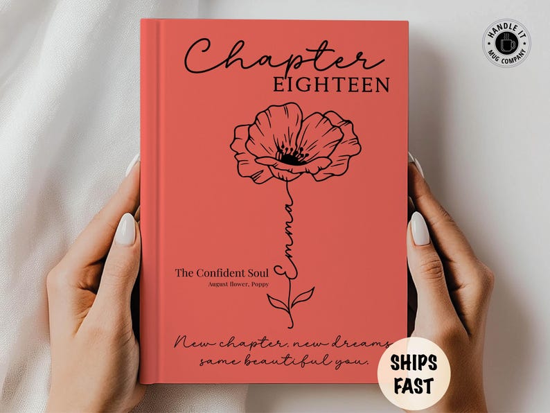 May include: A coral-colored hardcover book featuring the black text Chapter EIGHTEEN, a black line-art poppy flower with the name Emma integrated into the stem, the text The Confident Soul, August flower, Poppy, and New chapter, new dreams, same beautiful you.
