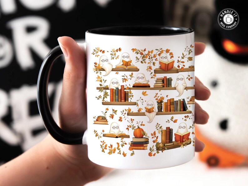 Bibliophile holding her ghost pattern Halloween mug gift.