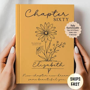 May include: Mustard-colored book cover with the words "Chapter SIXTY" in black script. A floral illustration and the name "Elizabeth" are featured. Text includes "New chapter, new dream, same beautiful you."