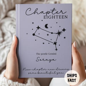 May include: A light purple hardcover book featuring the black text Chapter EIGHTEEN, a Gemini constellation graphic with a crescent moon, the phrase The gentle Gemini, the name Soraya, and the text New chapter, new dreams, same beautiful you.