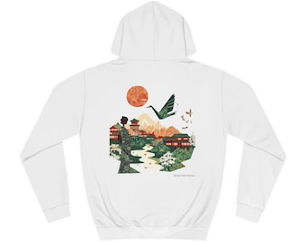 May include: White hooded sweatshirt with a graphic print of a Japanese landscape with a red sun, a green origami crane, and a person in a traditional kimono. The text "Flying Crane Factory" is printed at the bottom of the graphic.