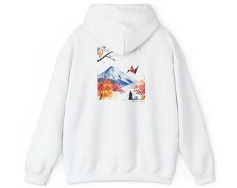 May include: White hoodie featuring a watercolor design of a mountain, trees, and a red origami crane. The design is on the back of the hoodie. The hoodie has a hood and long sleeves.