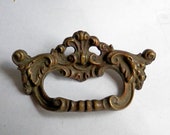 one (1) antique cast brass drawer pull or desk pull vintage