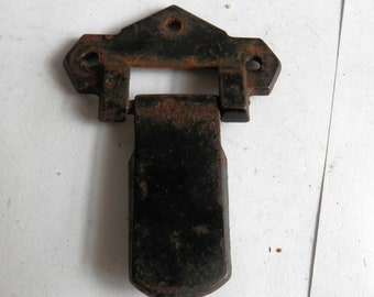 the top half of an antique trunk or box latch vintage